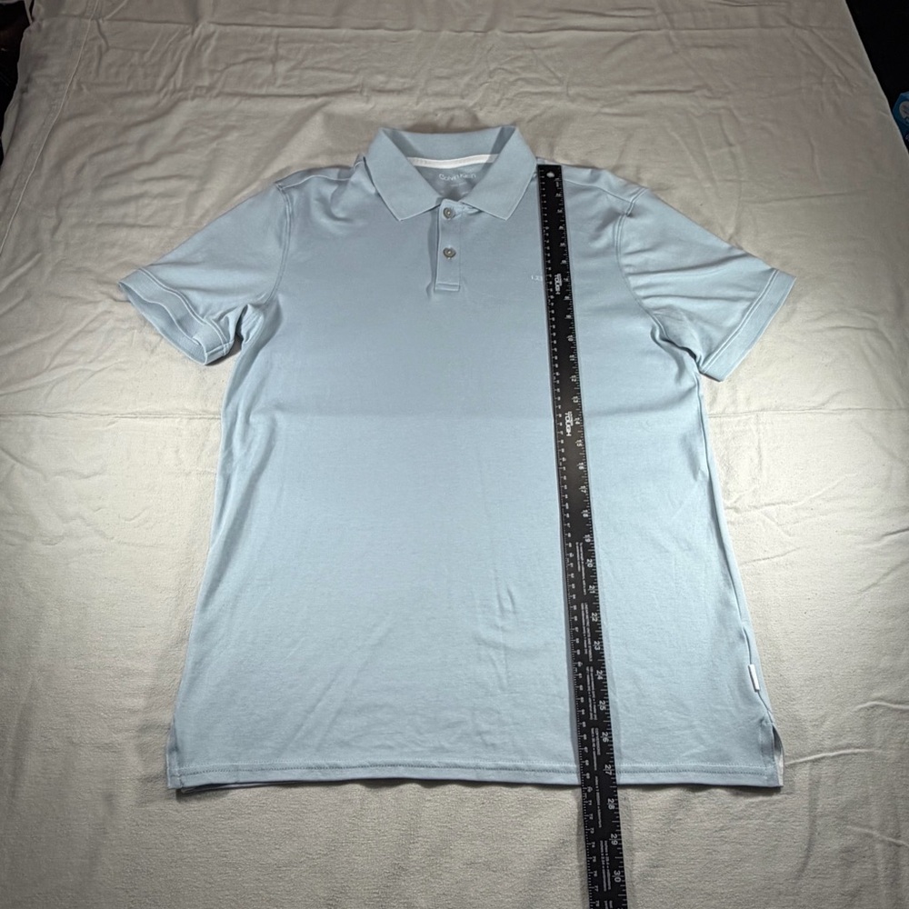 NWOT Calvin Klein Light Blue Liquid Polo Shirt